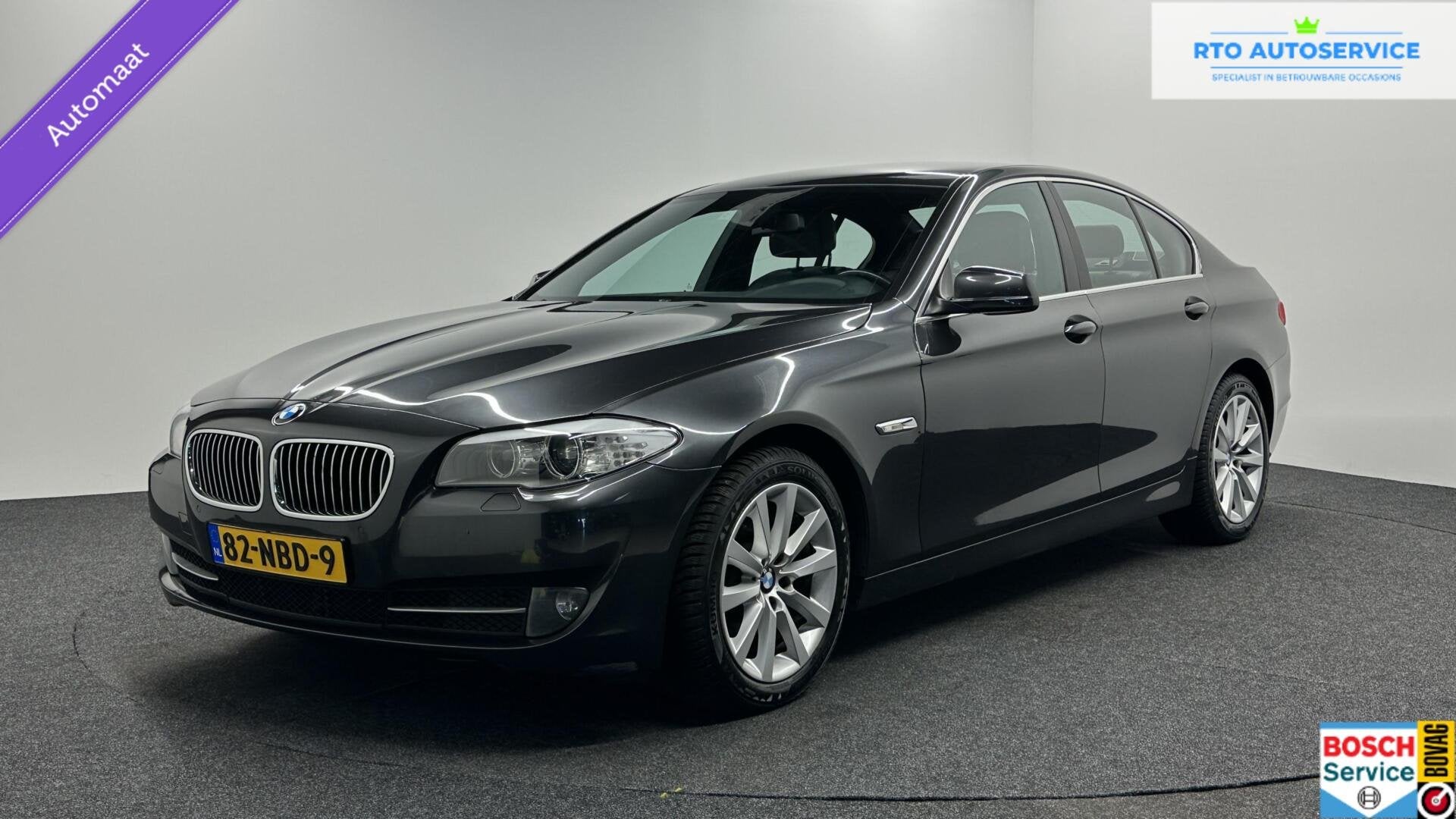 BMW 5-serie 523i High Executive LEER NAVI ECC STOELVERWARMIN, Euro 5, Achterwielaandrijving, Gebruikt, Zwart