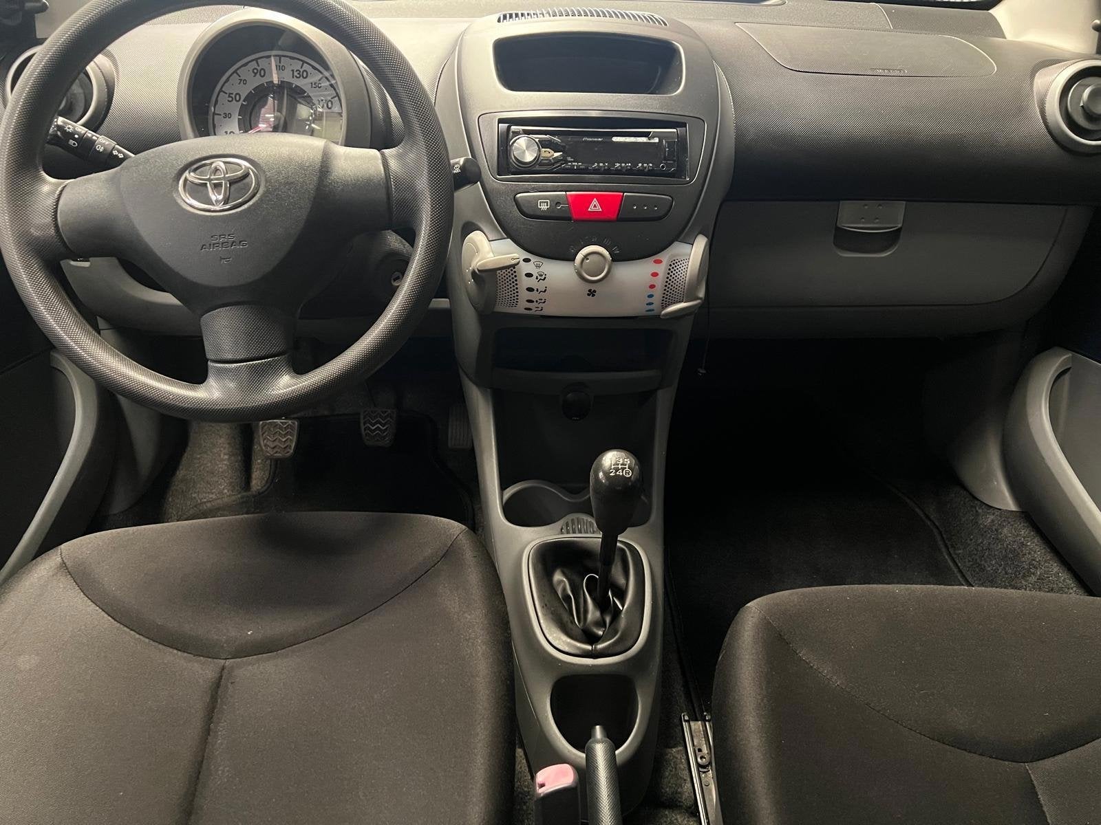 Toyota Aygo 1.0-12V Access 1e Eigenaar - NAP, Auto's, Voorwielaandrijving, Stof, Zwart, 68 pk