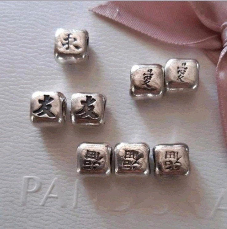 Pandora chinese tekens: vriendschap liefde en geluk, Verzenden, Pandora, Zo goed als nieuw, 4 bedels of meer