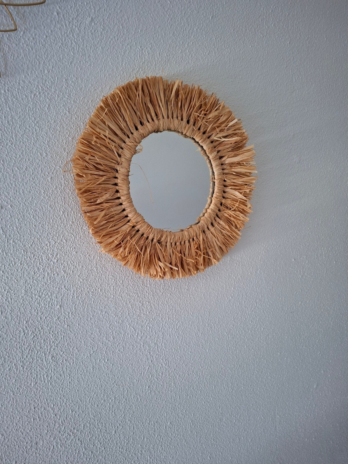 spiegel raffia, Ophalen