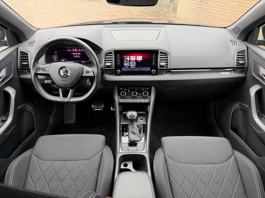 Skoda Karoq 1.5 TSI ACT Sportline Business|PANO|LED|ACC|, Auto's, Skoda, Stof, 4 cilinders, 150 pk, Zwart