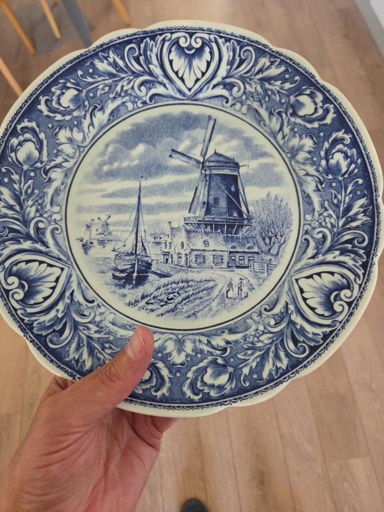 Delfts blauw bord molen, Ophalen