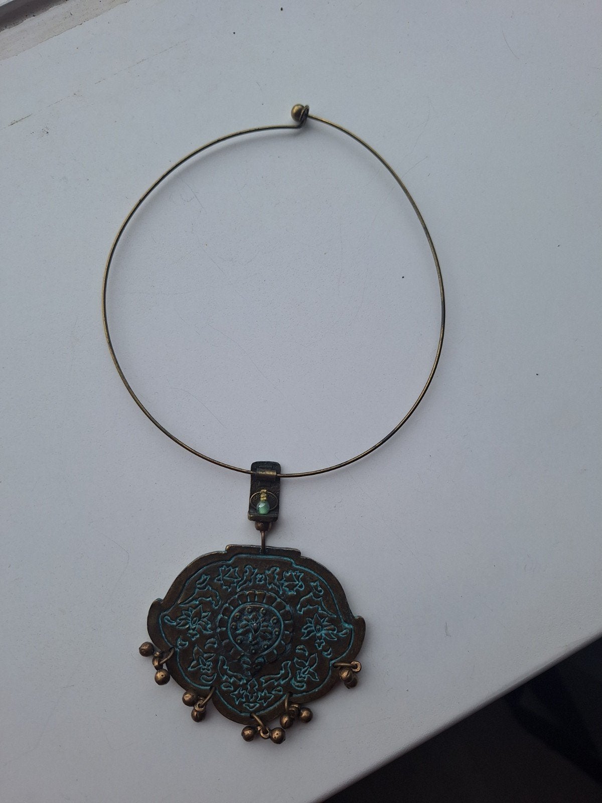 Vintage ketting met oosterse hanger en belletjes, Gebruikt, Ophalen of Verzenden, Goud, Overige materialen