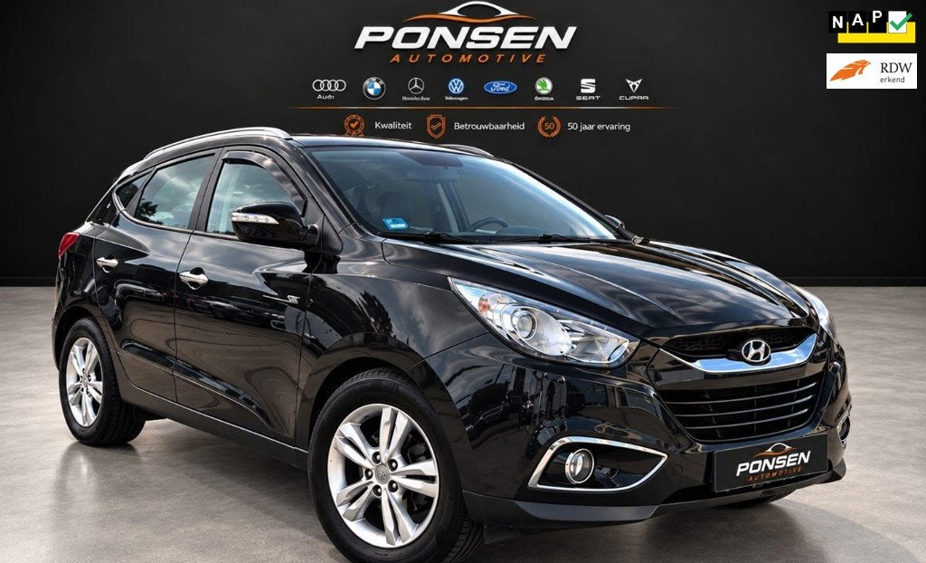 Hyundai Ix35 2.0i Style navi/clima control/half leder/ cruis, Auto's, Gebruikt, 4 cilinders, Leder en Stof, Origineel Nederlands