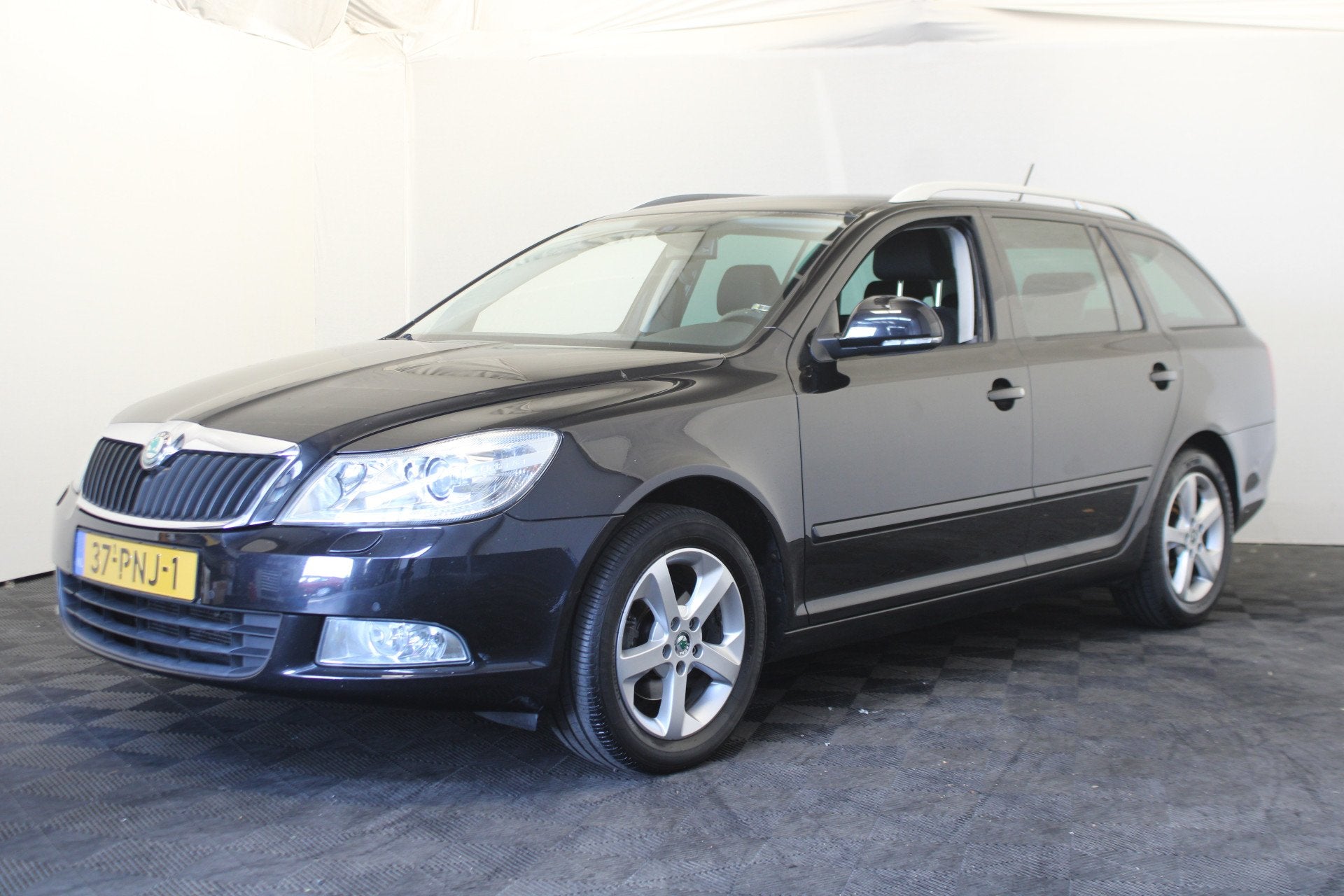 Skoda Octavia Combi 1.2 TSI Elegance Business Line, Auto's, Skoda, Euro 5, Stof, Gebruikt, 4 cilinders