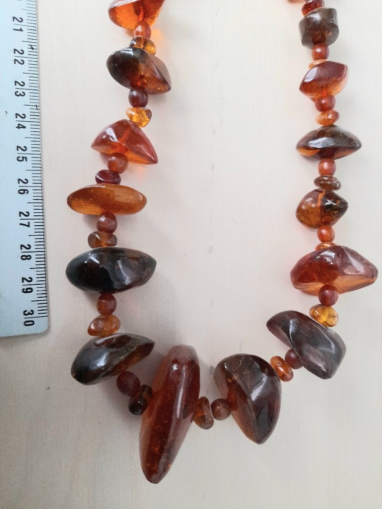Mooie ketting met zeer grote barnstenen barnsteen kralen, Ophalen of Verzenden, Gebruikt, Bruin, Steen of Mineraal