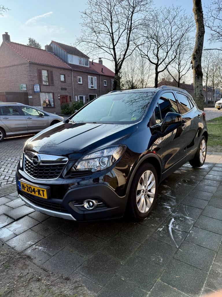 Opel Mokka 1.4 Turbo 16V S&S 103KW H6 2014 Zwart, Auto's, Voorwielaandrijving, Zwart, 4 cilinders, Zwart