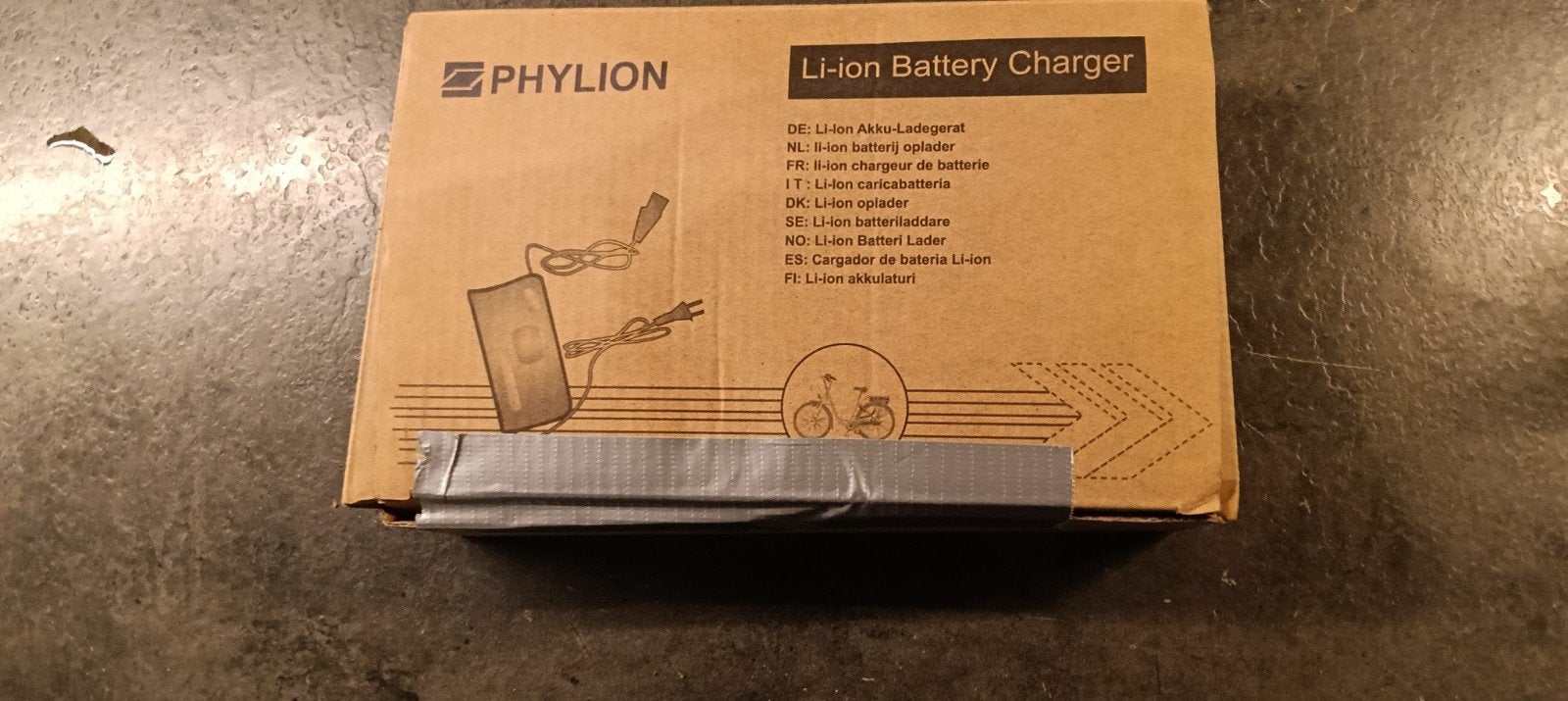 Zo goed als nieuwe E-bike oplader (Phylion), Ophalen of Verzenden