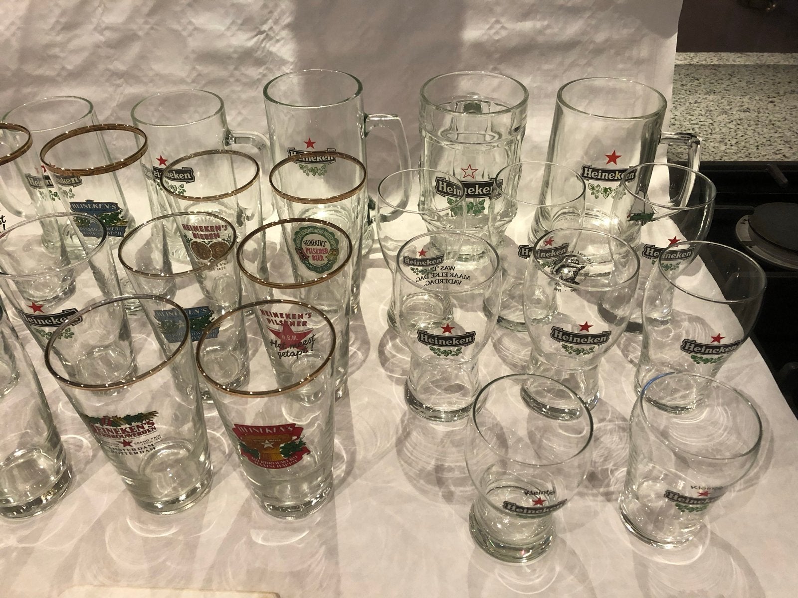 Grote collectie Heineken bierglazen (ca.100 stuks), Ophalen of Verzenden, Zo goed als nieuw, Glas of Glazen, Heineken