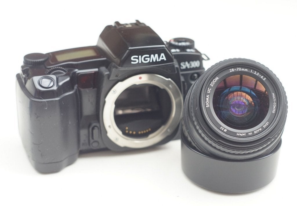Sigma SA-300 met Sigma UC 28-70mm lens (ongecontroleerd), Ophalen of Verzenden, Compact, Overige Merken