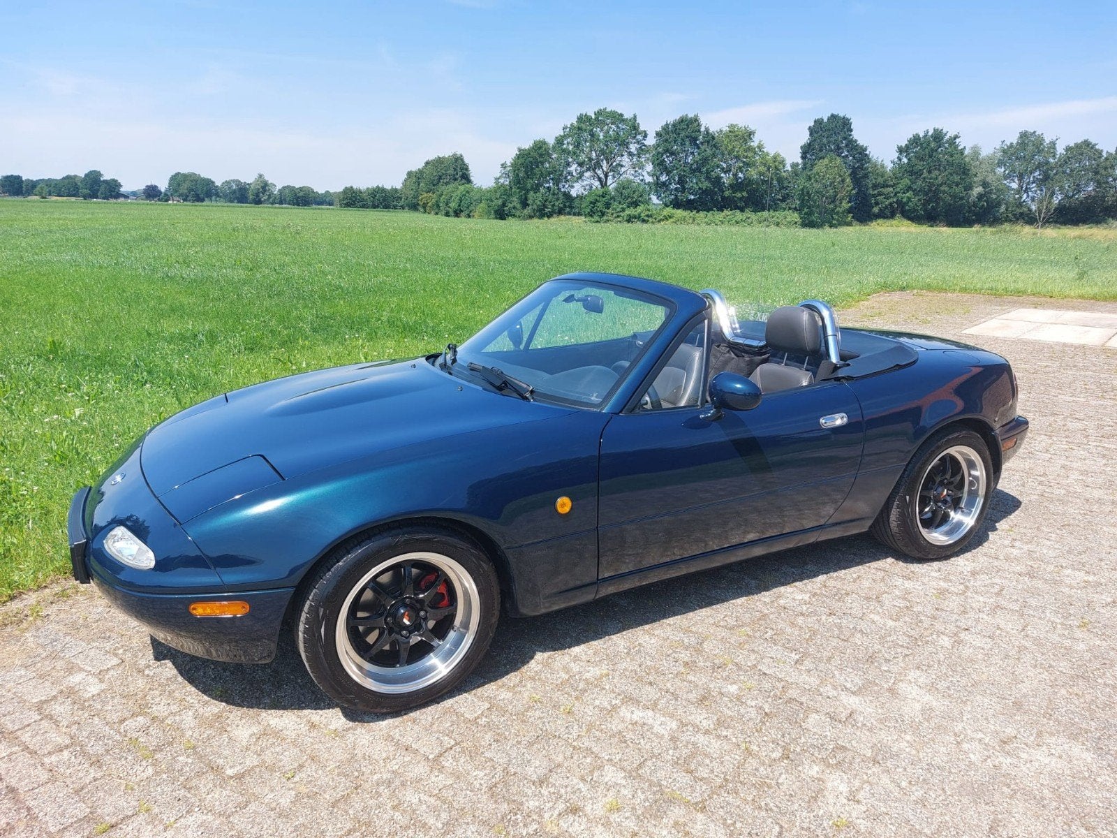 Mazda MX-5 NA 1.6i 16v dohc 1998 montego blue mica, Auto's, Achterwielaandrijving, 40 €/maand, 4 cilinders, Cabriolet