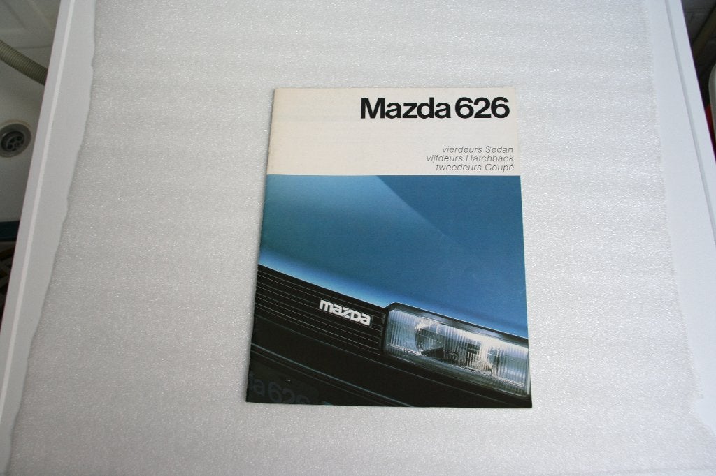 Folder Mazda 626 (10-1986) (35), Ophalen of Verzenden, Nieuw, Mazda