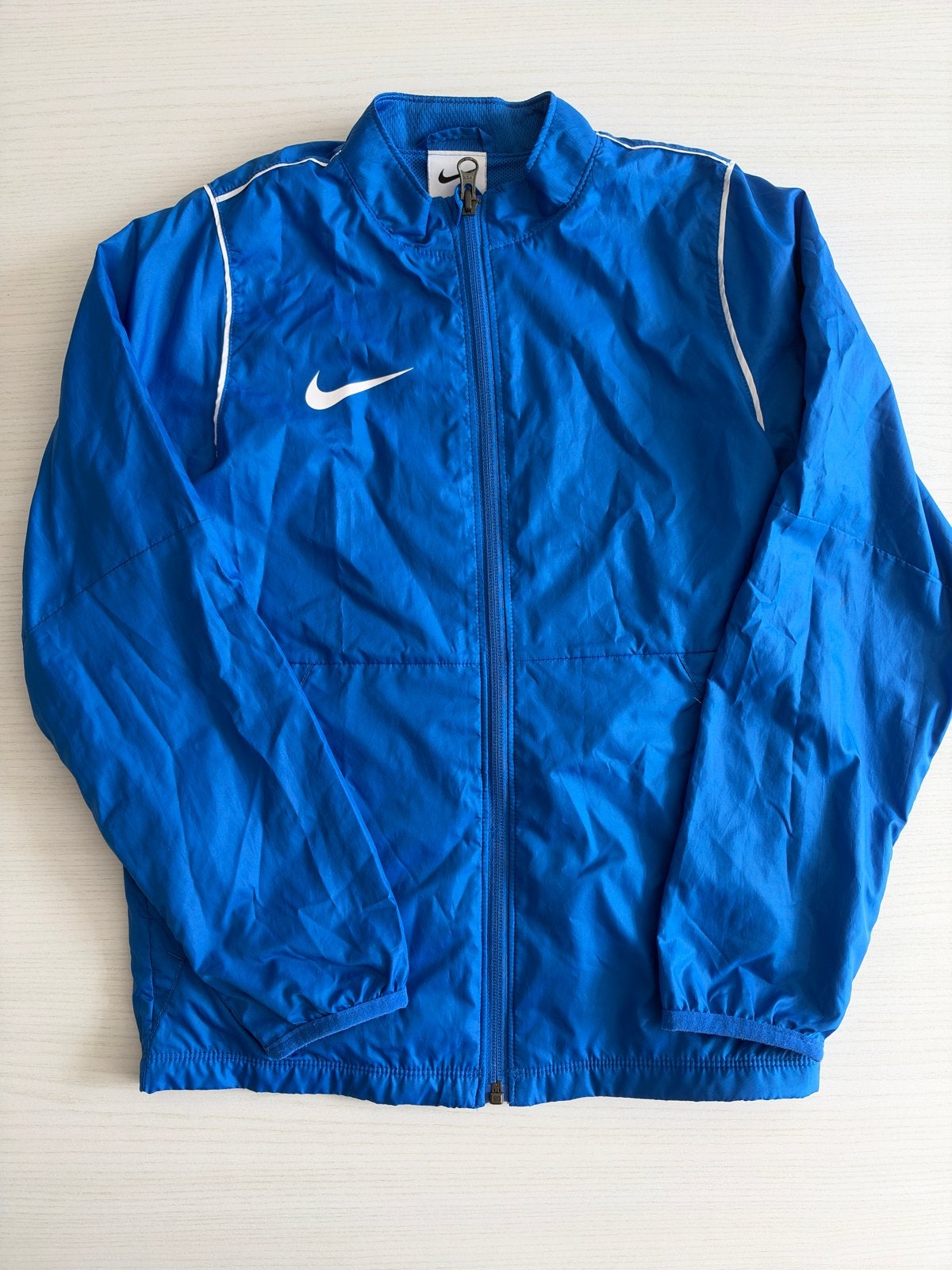 Nike Windjack Blauw - Maat S (128-137 cm), Ophalen of Verzenden, Gebruikt, Jongen of Meisje