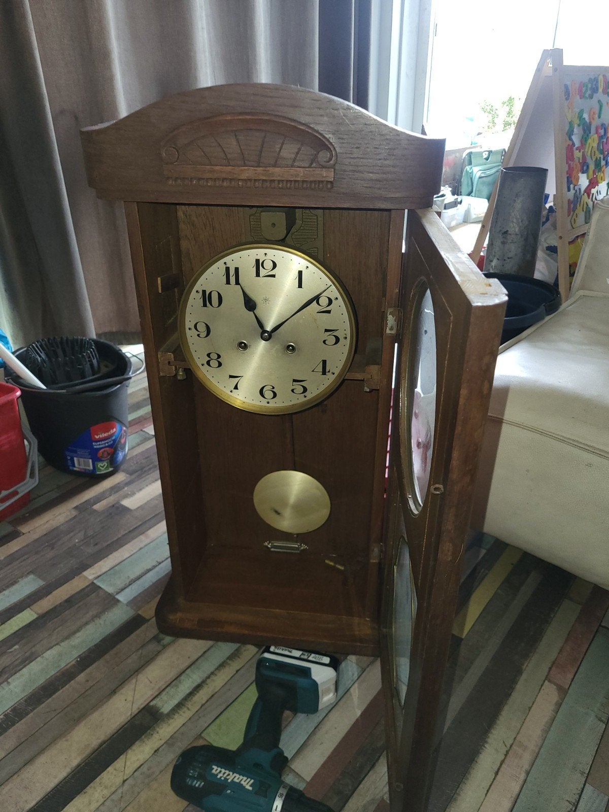 Antieke houten Junghans B32 klok, Ophalen