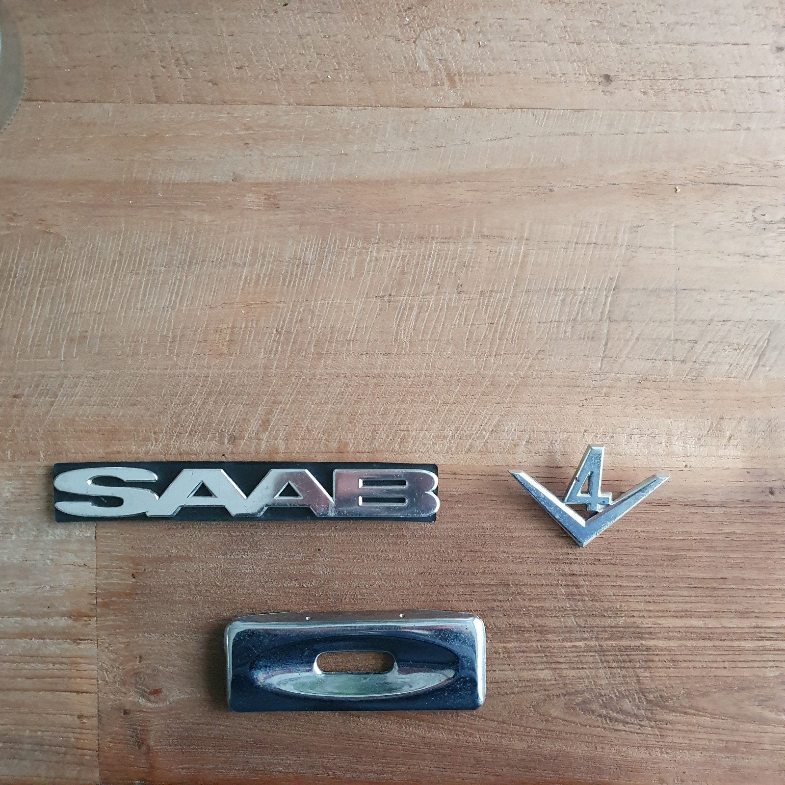 Saab emblemen en gordelhoesje voor 95 en 96, Ophalen of Verzenden, Gebruikt, Saab