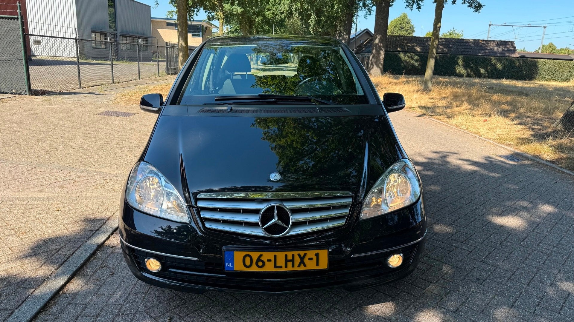 Mercedes-Benz A-klasse 160 Business Class Avantgarde AUTOMAA, 15 km/l, Leder en Stof, Zwart, Navigatiesysteem