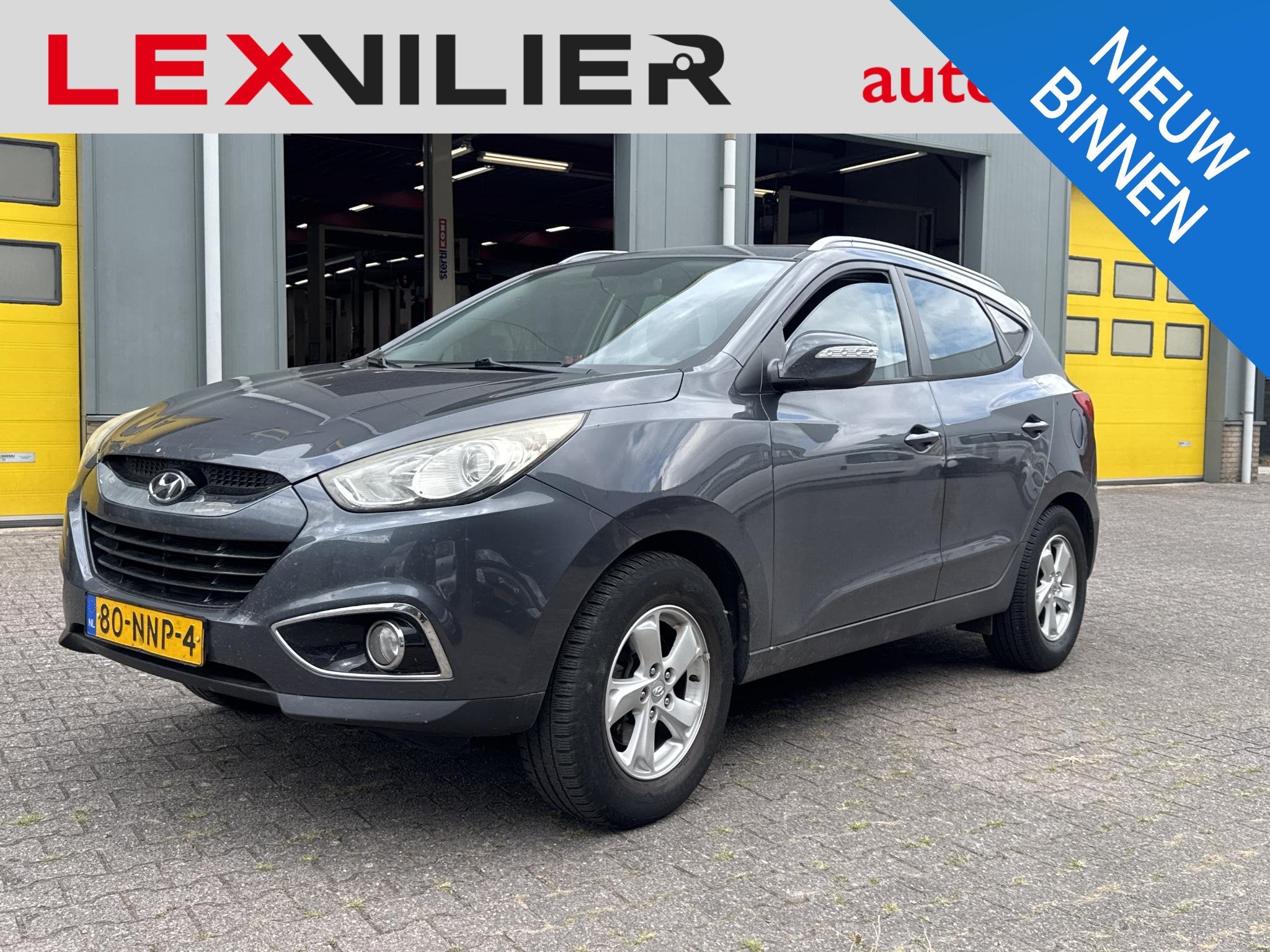 Hyundai ix35 2.0i Business Edition, Auto's, Gebruikt, 4 cilinders, Leder en Stof, 163 pk