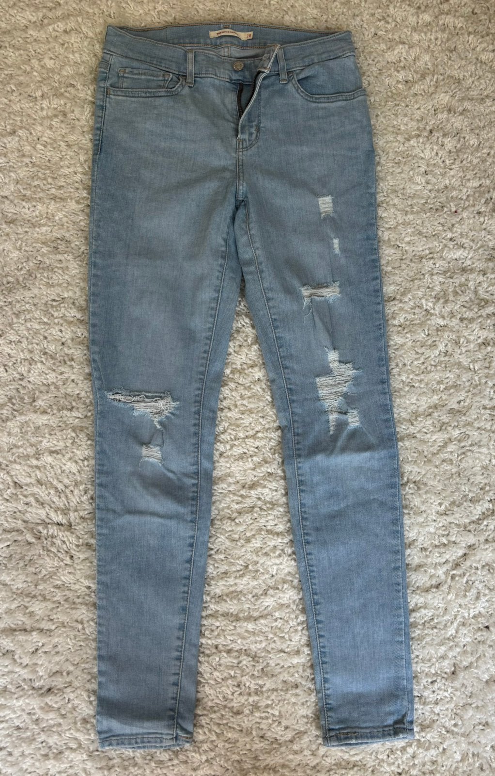 Levi’s 710 Super Skinny ripped jeans W28 lichtblauw, Ophalen of Verzenden, Gedragen, Blauw, W28 - W29 (confectie 36)