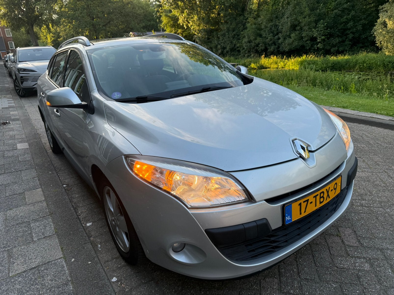 Renault Mégane 1.4 16V TCE 96KW Estate 2012 Grijs, Auto's, Renault, Voorwielaandrijving, Stof, 4 cilinders, Origineel Nederlands