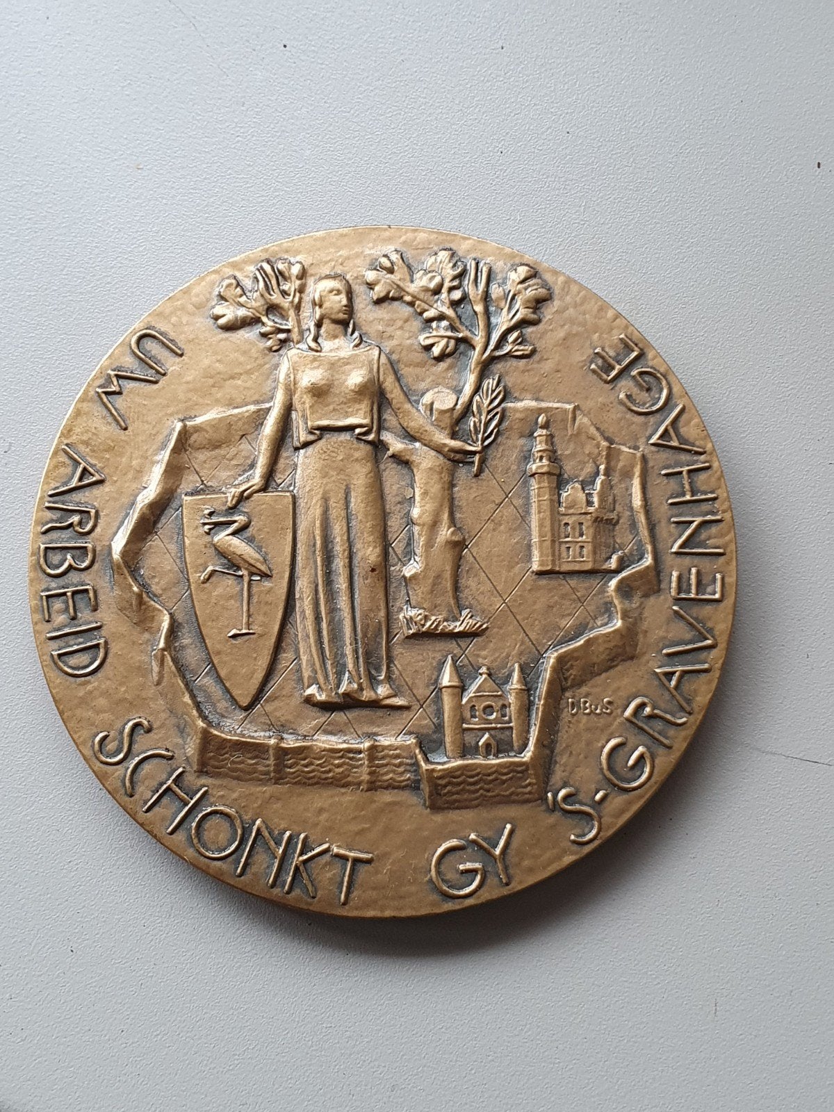 Bronzen Penning 'Uw Arbeid Schonk Gy 's-Gravenhage', Ophalen of Verzenden