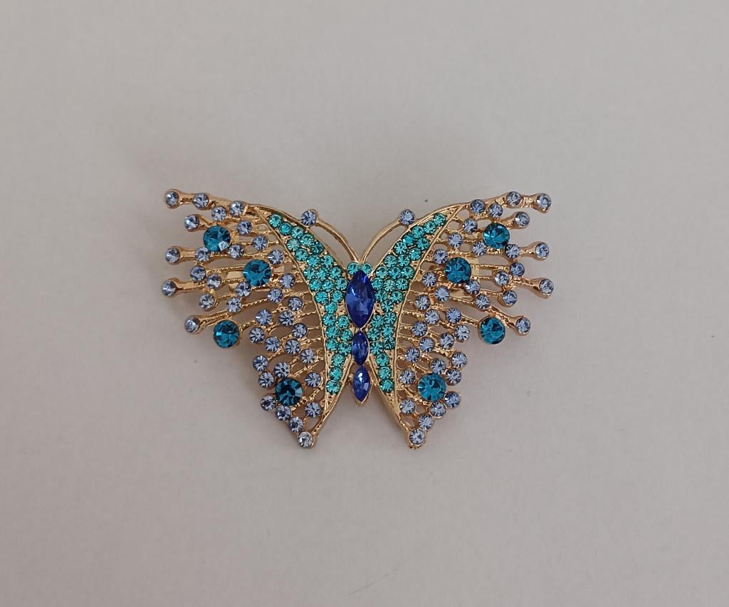 Vlinder broche, Sieraden, Tassen en Uiterlijk, Broches, Nieuw, Overige materialen, Overige kleuren, 4 tot 7 cm, Met strass, Ophalen of Verzenden