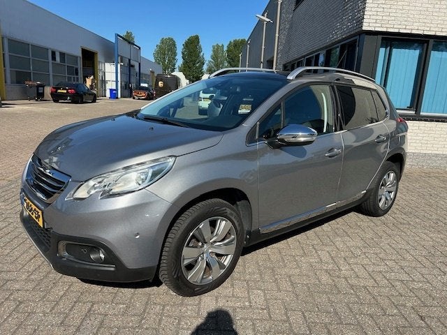 Peugeot 2008 1.2 PureTech Allure PANO CLIMA NAVI CRUISE, Auto's, Euro 5, 1199 cc, 82 pk, Leder en Stof