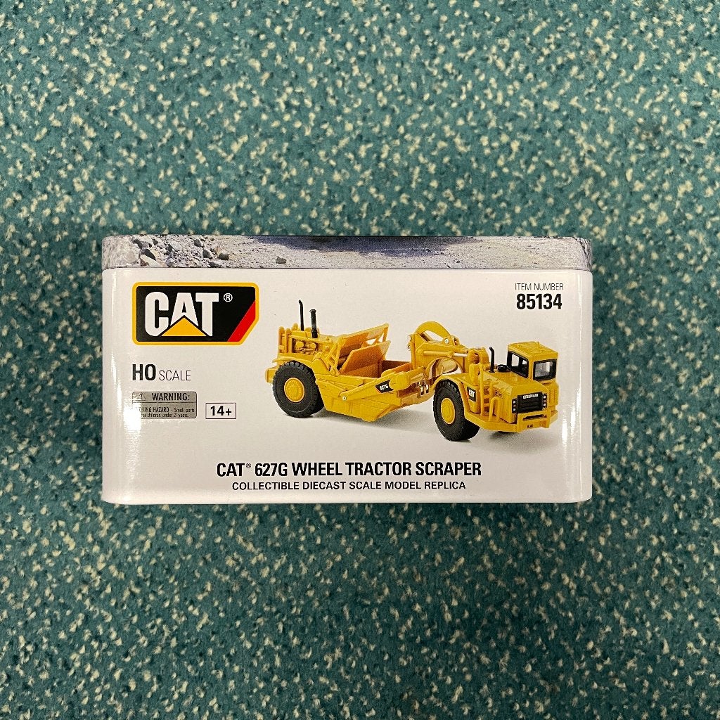 Diecast Masters 1/87 CAT 627G, Ophalen of Verzenden, Nieuw, Hijskraan, Tractor of Landbouw, Overige merken