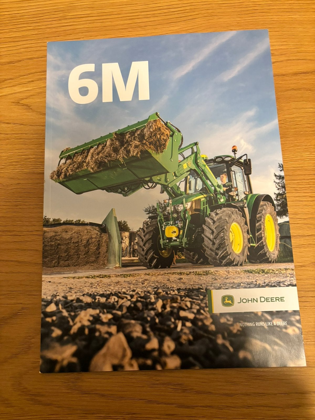 John Deere 6m folder, Ophalen of Verzenden, Zo goed als nieuw