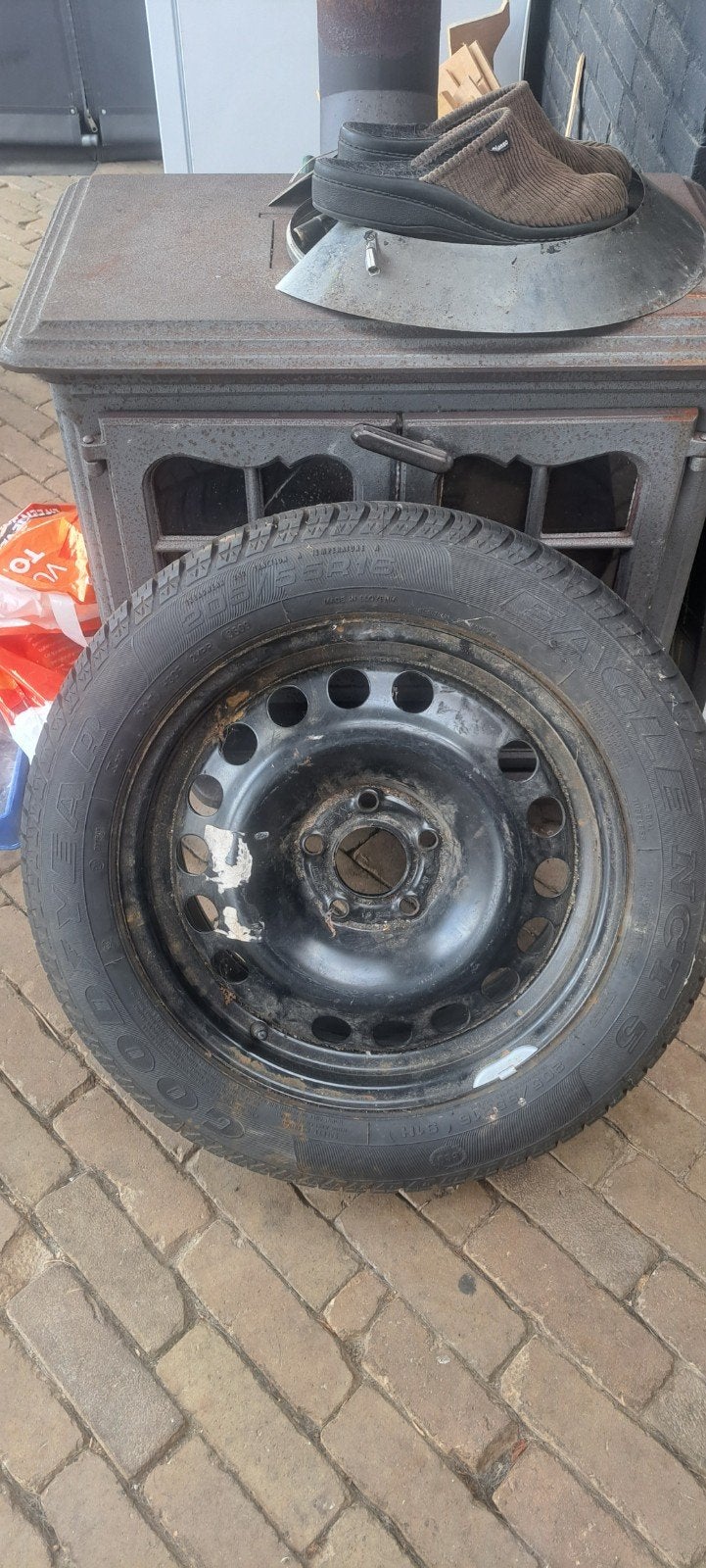 Wiel met goede band opel astra, Ophalen