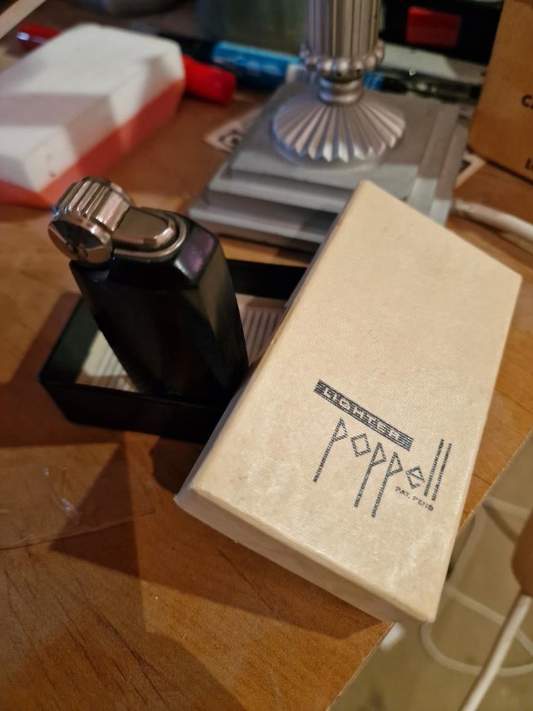 Poppell vintage aansteker in originele verpakking, Verzamelen, Rookartikelen, Aanstekers en Luciferdoosjes, Ophalen of Verzenden