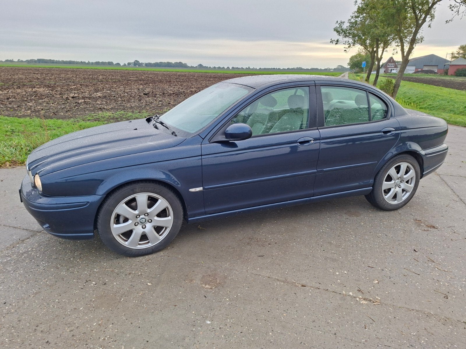 Jaguar X-Type 2.5 V6 Executive AUT 4WD 2006 Blauw, Auto's, Automaat, 196 pk, Beige, 2495 cc