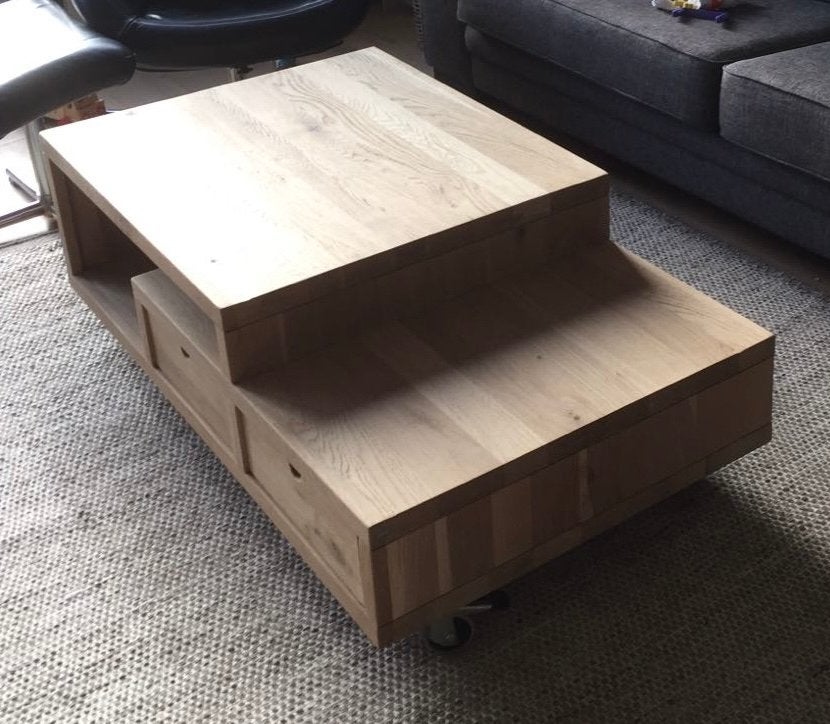 Eikenhouten salontafel met lades en wielen, Ophalen, 50 – 75, Gebruikt, 100 tot 150 cm