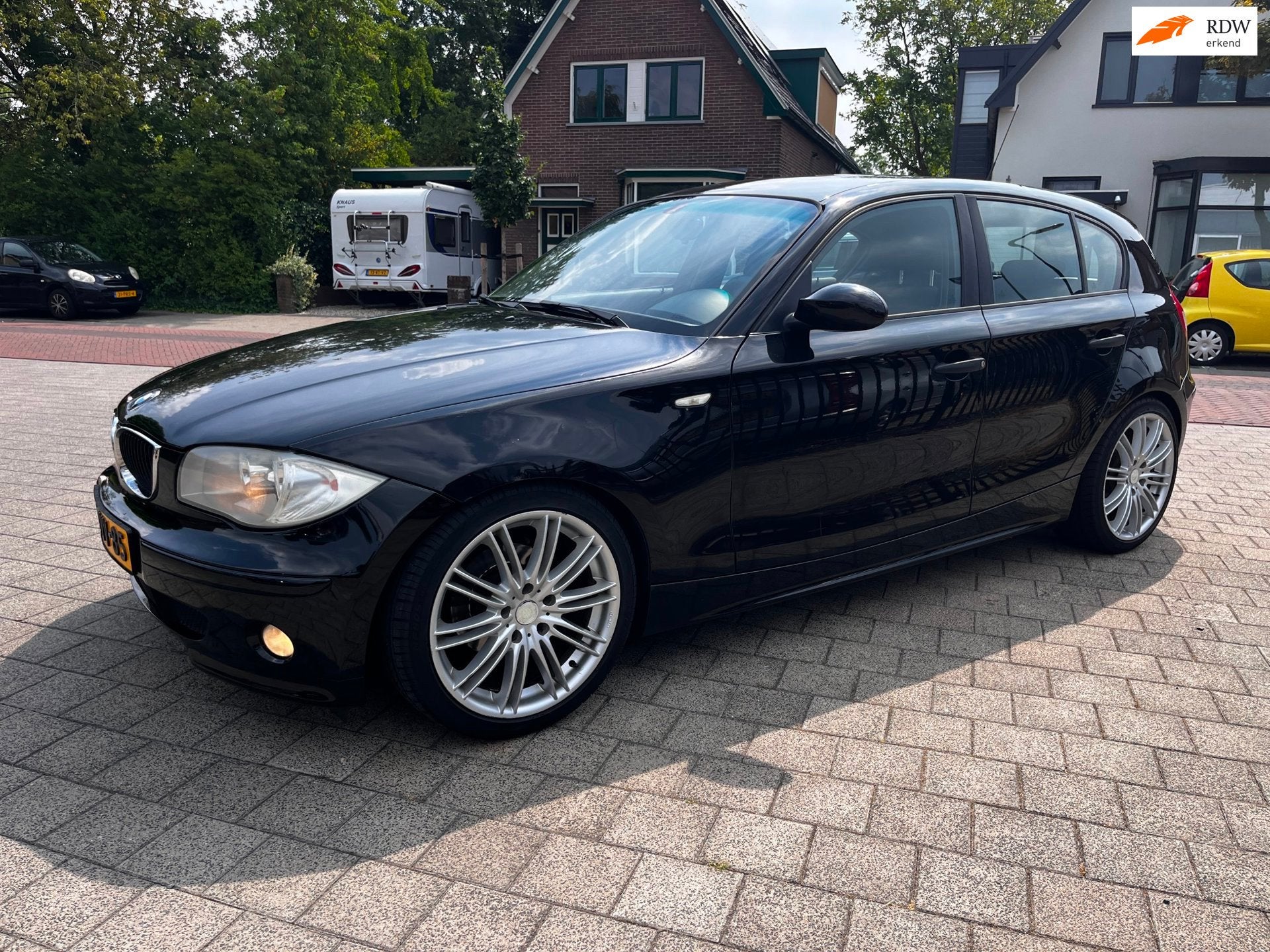 BMW 1-serie 116i Sport Airco 5 Drs isofix NW APK LM18, 1596 cc, Gebruikt, Zwart, 4 cilinders