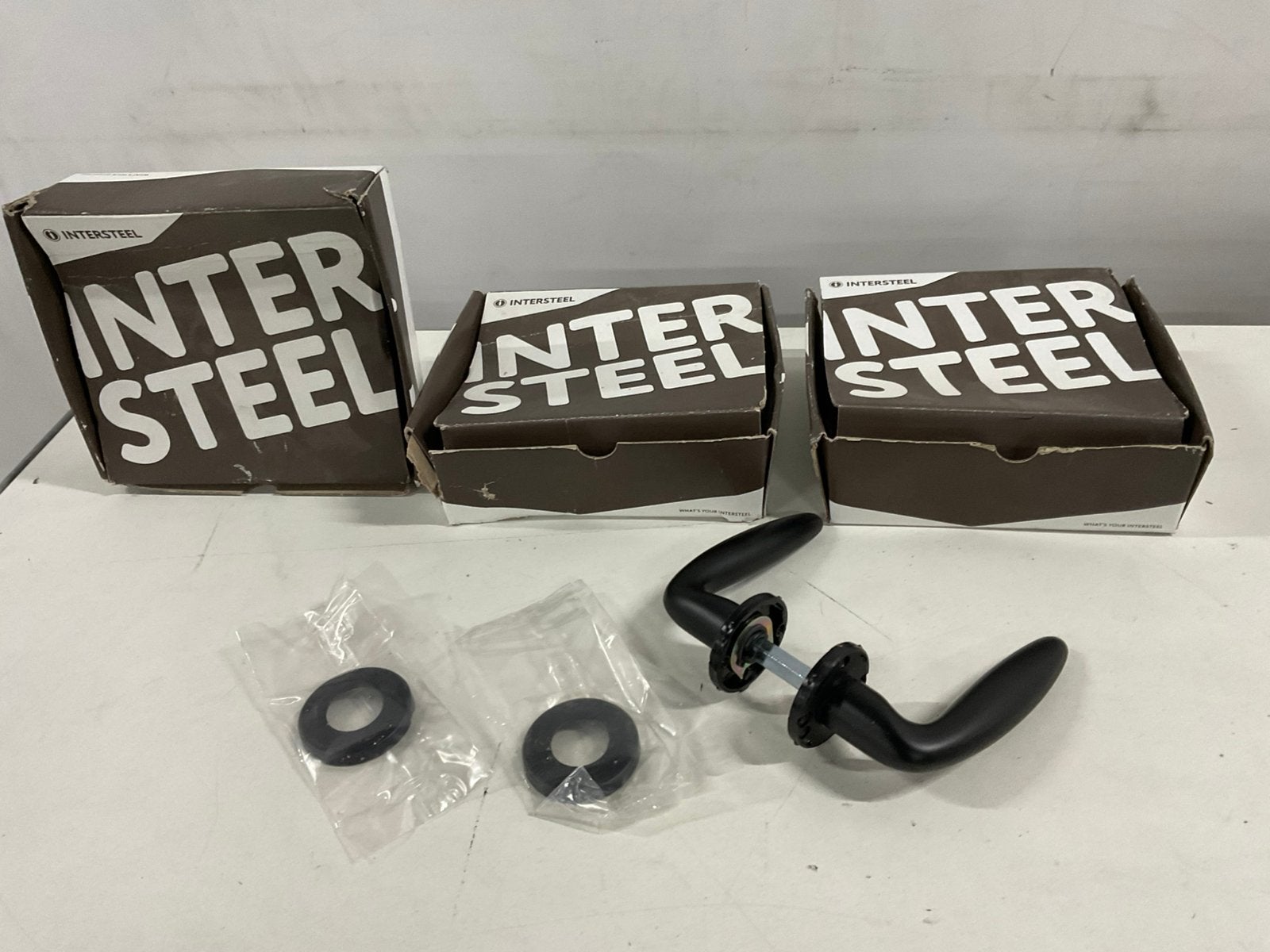 3 sets zwarte deurklinken merk Intersteel, Ophalen, I, Intersteel, Nieuw