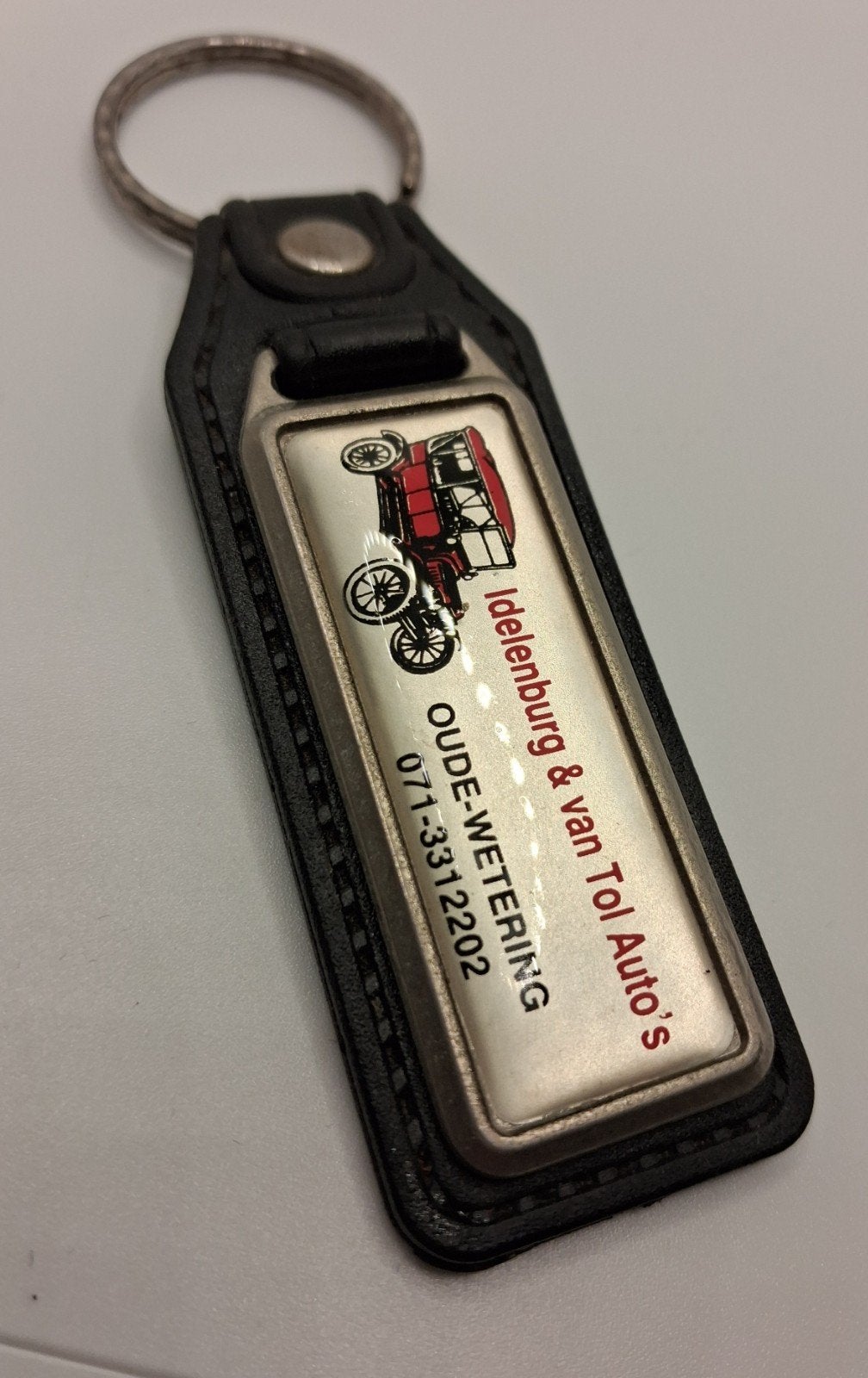 Vintage sleutelhanger Idelenburg & van Tol Auto's, Ophalen of Verzenden