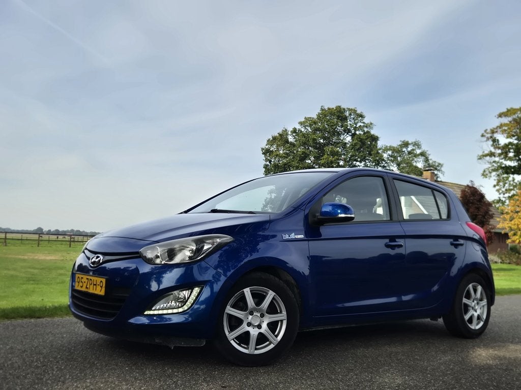 Hyundai i20 1.2i i-Motion (bj 2013), Auto's, Euro 5, Gebruikt, 31 €/maand, 4 cilinders