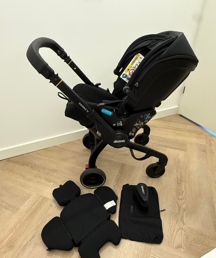 Doona x, Kinderen en Baby's, Autostoeltjes, Zo goed als nieuw, Overige merken, 0 t/m 13 kg, Autogordel of Isofix, Zijbescherming