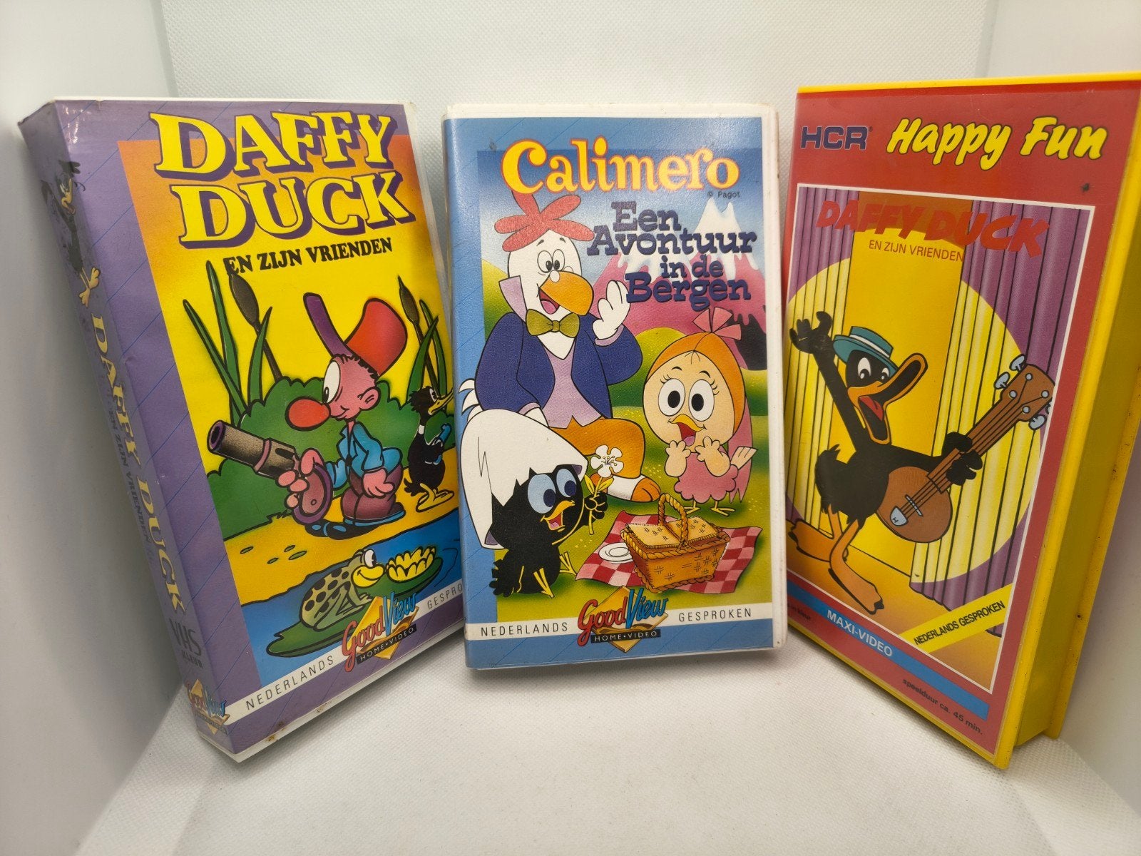2 daffy Duck VHS en Calimero VHS lot, Ophalen of Verzenden, Zo goed als nieuw