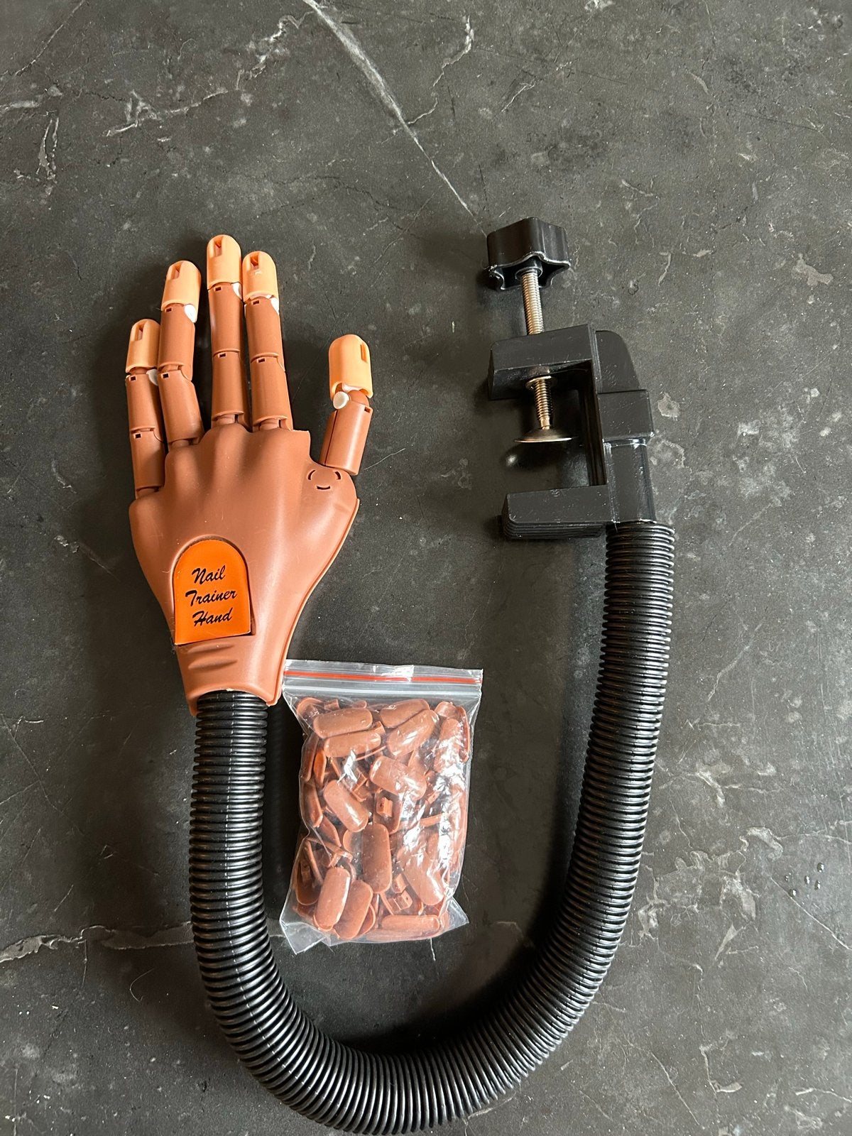 Nail trainer hand met opzetnagels, Ophalen