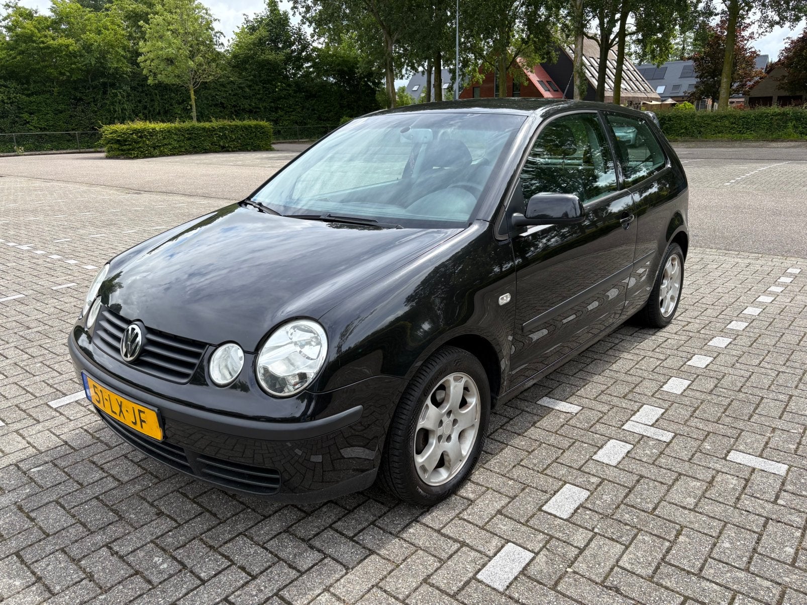 Volkswagen Polo 1.4 55KW 2003 Zwart, Voorwielaandrijving, 4 cilinders, Zwart, Origineel Nederlands