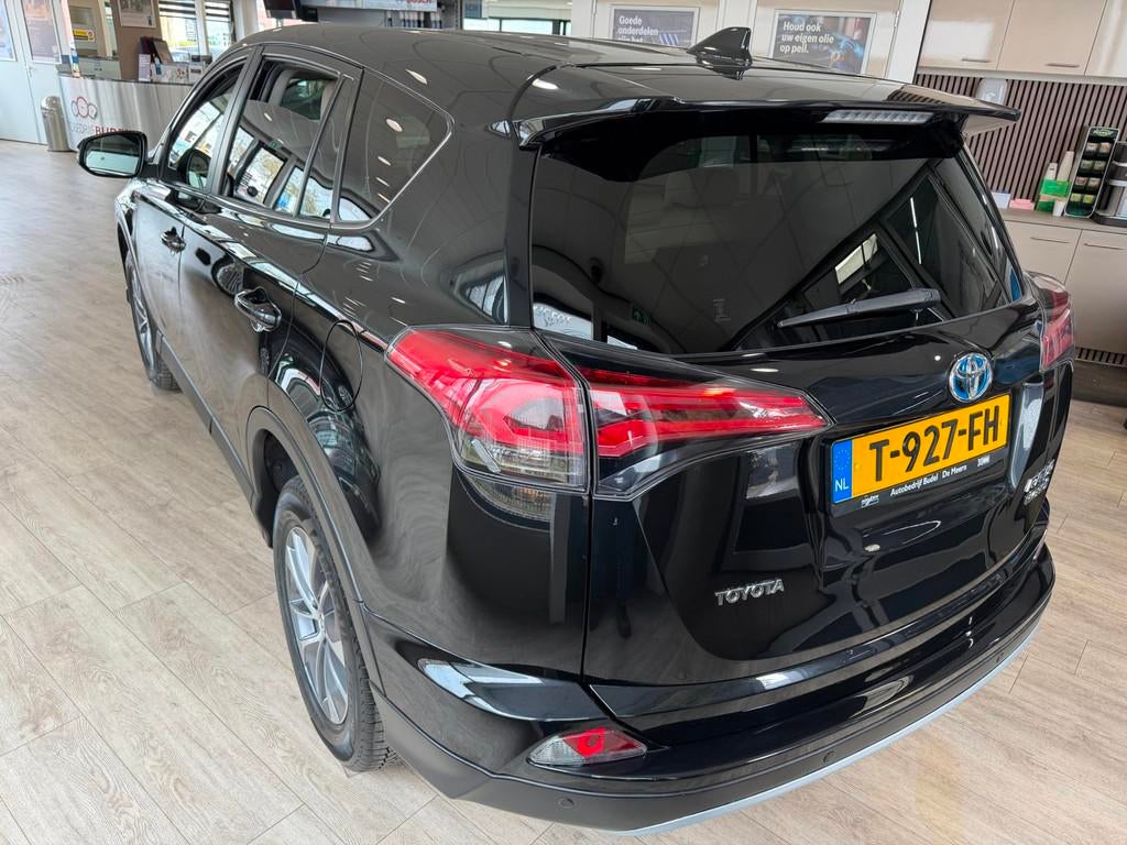 Toyota RAV4 2.5 Hybrid Dynamic Business Plus, Auto's, Toyota, Gebruikt, Zwart, Bedrijf, 155 pk