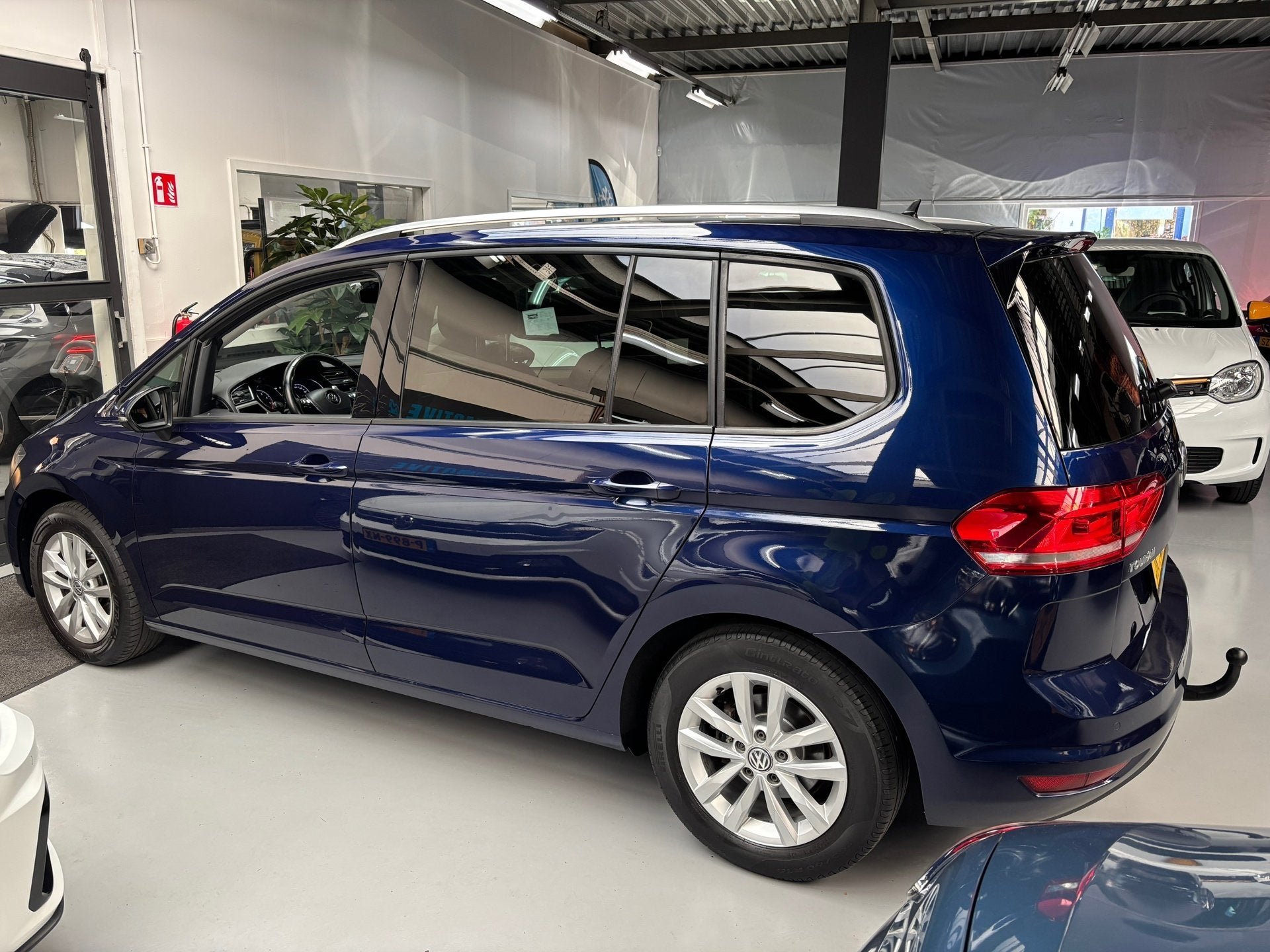 Volkswagen Touran 1.2 TSI Comfortline 7persoons / Navi, Voorwielaandrijving, Gebruikt, 4 cilinders, Met garantie (alle)