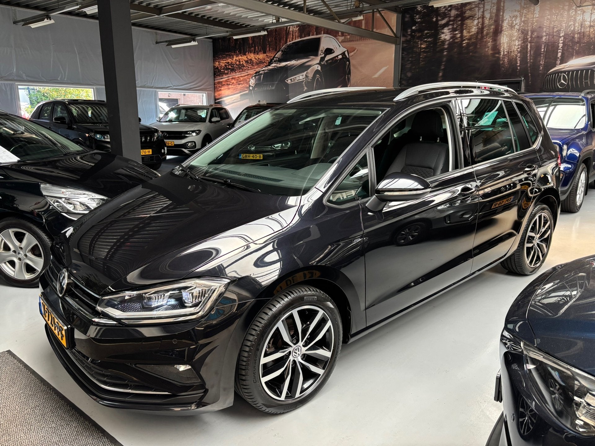Volkswagen Golf Sportsvan 1.0 TSI Highline Edition Camera /, Stof, Gebruikt, Met garantie (alle), Zwart