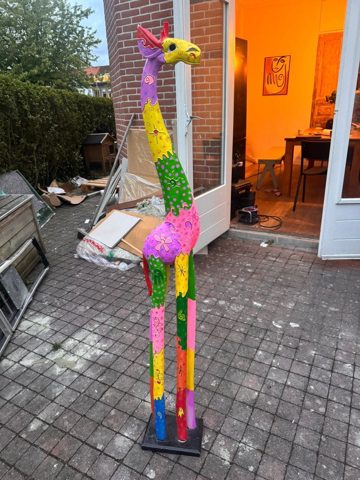 Handbeschilderde giraffe, Ophalen