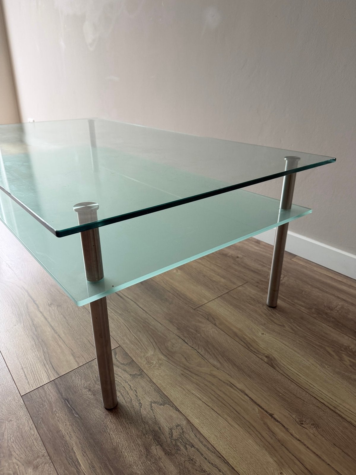 Glazen salontafel met design poten, Ophalen, Gebruikt, 100 tot 150 cm, 50 tot 100 cm