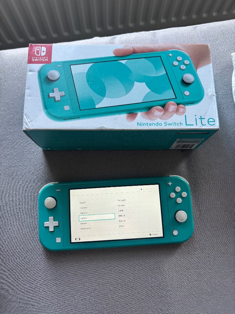 Nintendo Switch Lite blauw, Spelcomputers en Games, Spelcomputers | Nintendo Switch Lite, Ophalen of Verzenden, Turquoise, Gebruikt