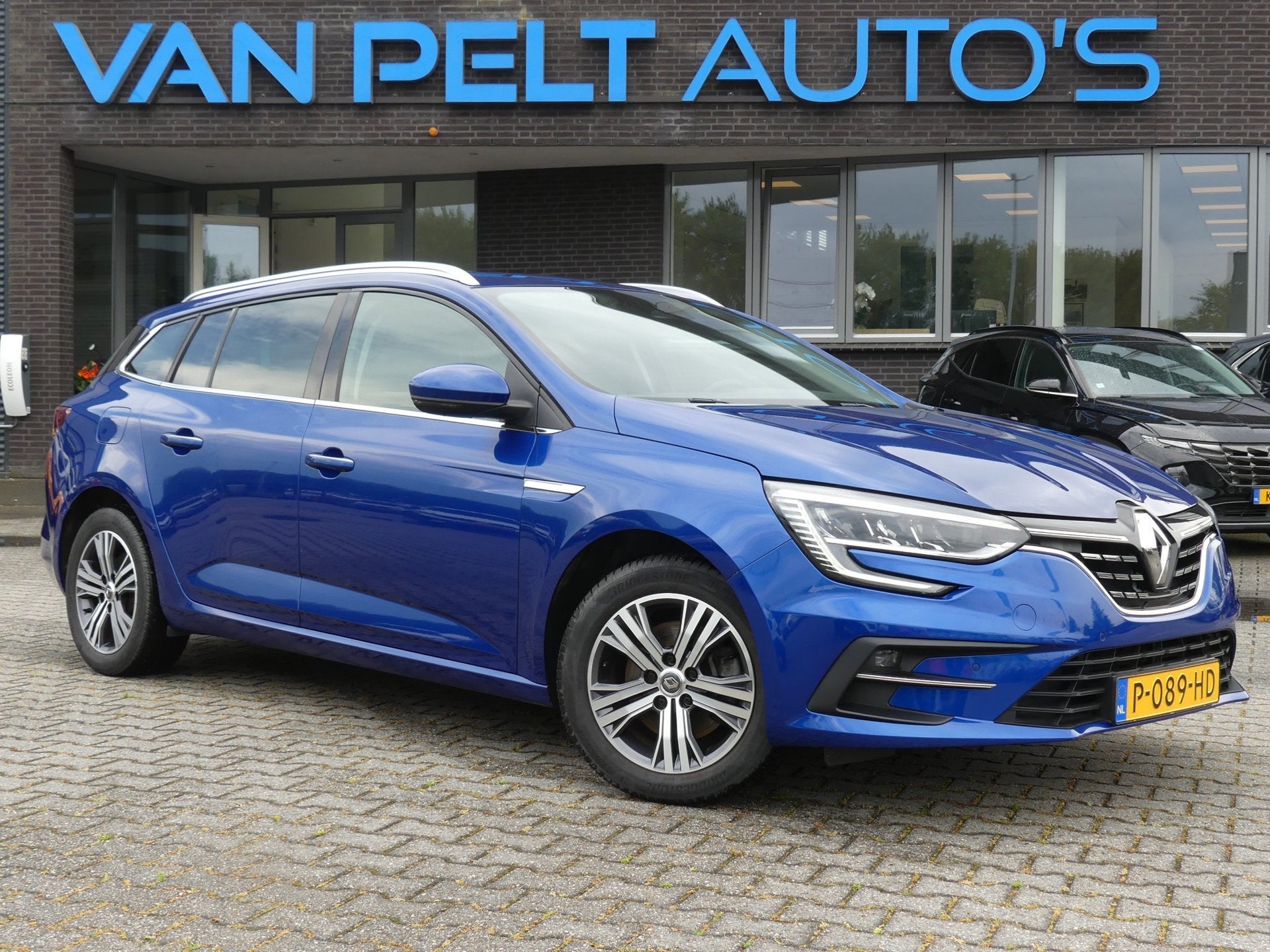 Renault Mégane Estate 1.6 E-Tech Plug-in Hybrid 160 Intens, Auto's, 77 km/l, Gebruikt, 4 cilinders, Blauw
