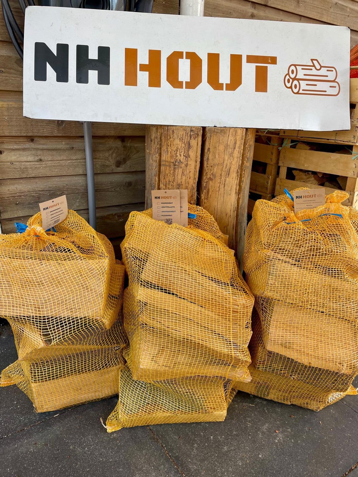 Beuken haardhout netzak 15 kg €12,50, Minder dan 3 m³, Ophalen of Verzenden, Beukenhout, Blokken