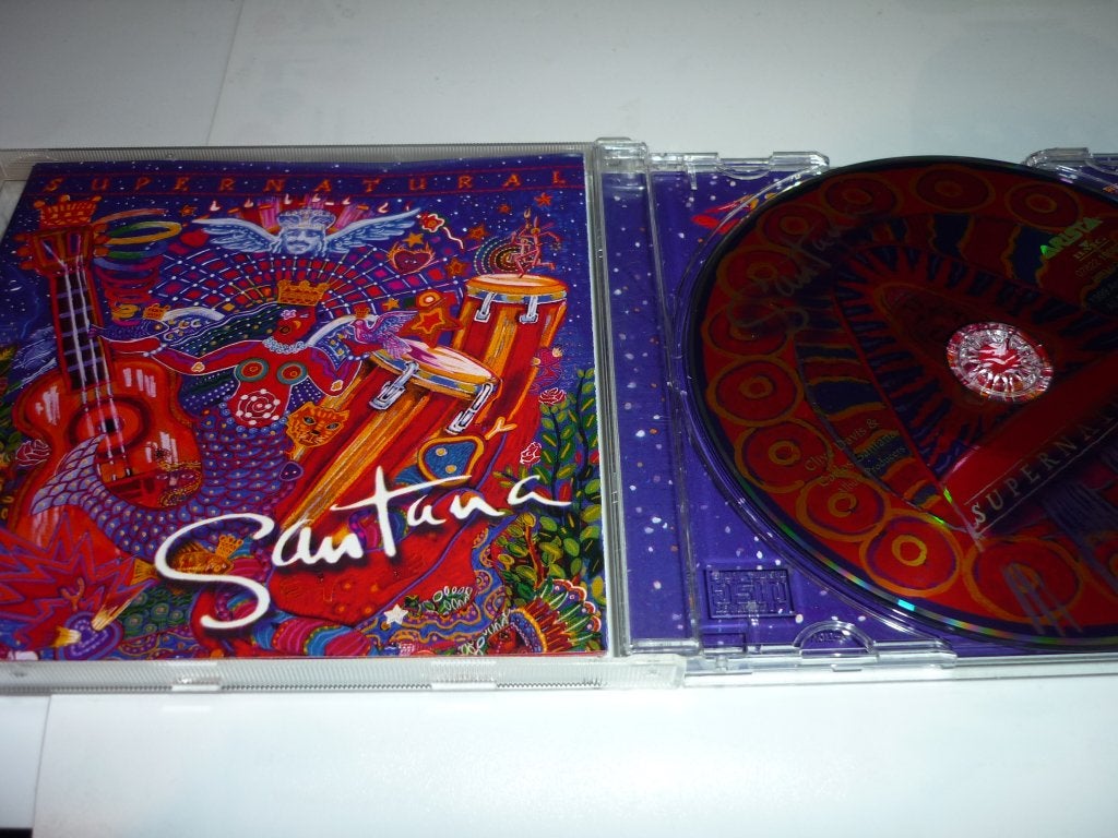 Santana - Supernatural CD (Classic Rock, Latin Rock), Inclusief boekje, Ophalen of Verzenden, Zo goed als nieuw, Classic Rock