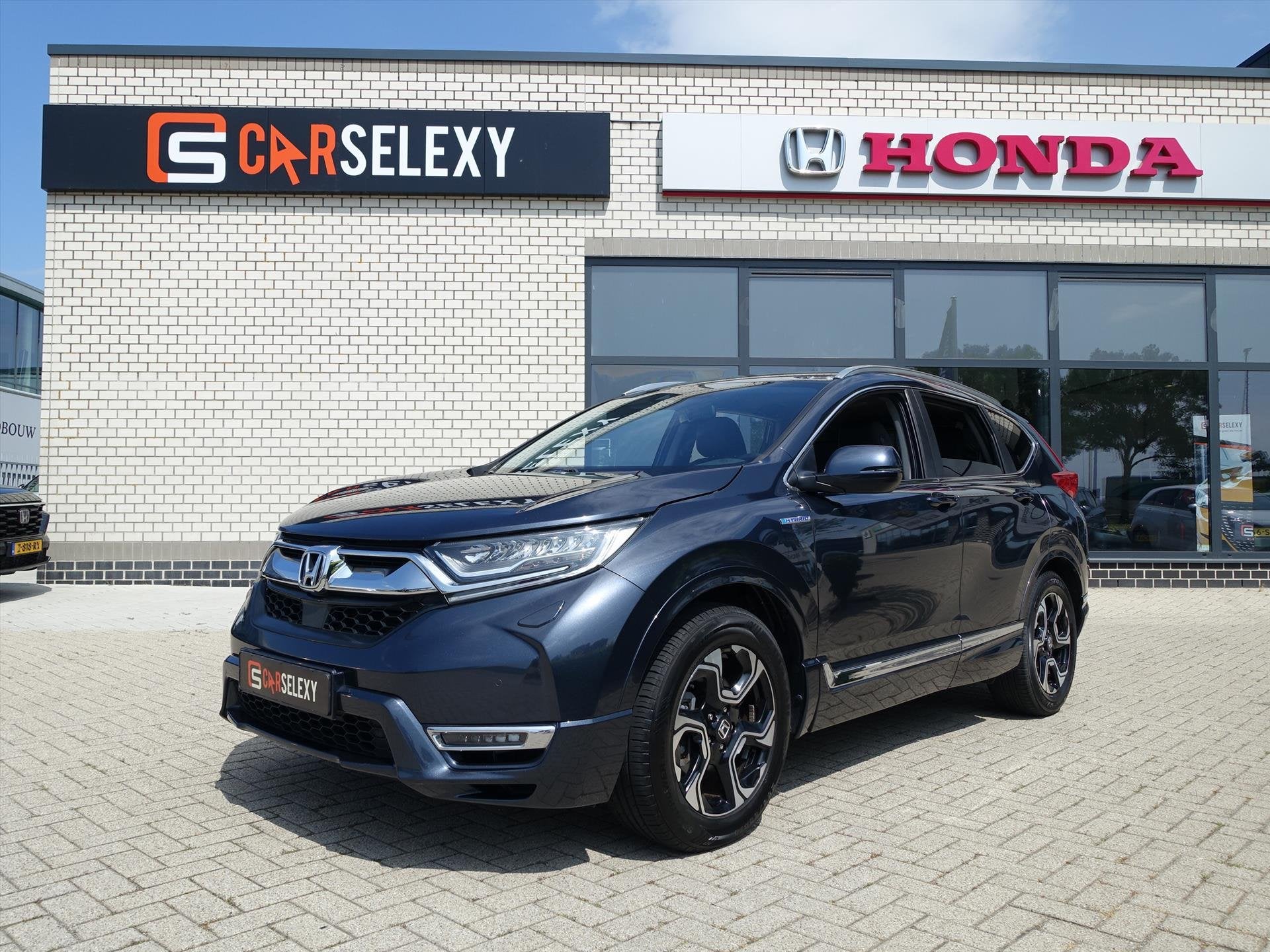 HONDA CR-V 2.0 Hybride 184pk 2WD E-CVT Lifestyle, Auto's, Automaat, Gebruikt, Blauw, Leder